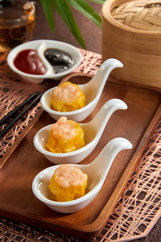 Dim sum in a bamboo steamer