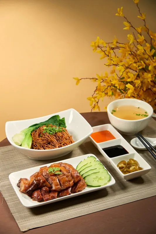 Signature Cantonese Roast Duck being prepared